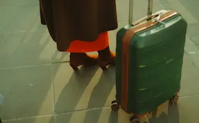 green axe embedded in a wooden log at Unique Escapes NY