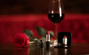 romantic dinner setup with wine glasses and candles at Unique Escapes NY