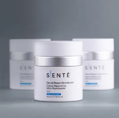 Three white jars of Sente Dermal Repair Ultra-Nourish cream, with one in sharp focus in the foreground at Becker Cosmetic featuring Skincare Products services