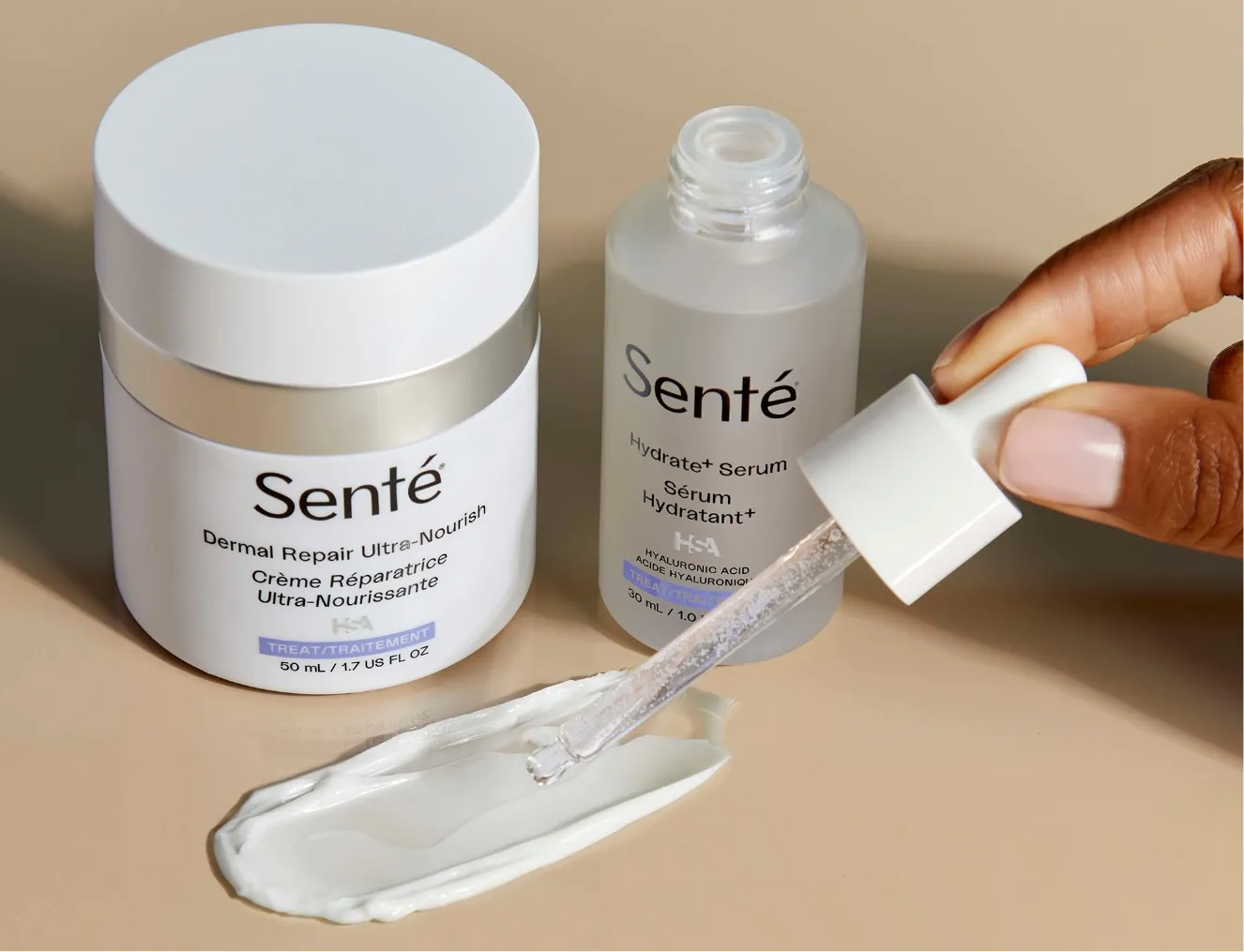 Two Sente skincare products, Dermal Repair Ultra-Nourish cream and Hydrate+ Serum, displayed with serum being applied to a cream swatch by a hand at Becker Cosmetic featuring Medical-grade Skincare services