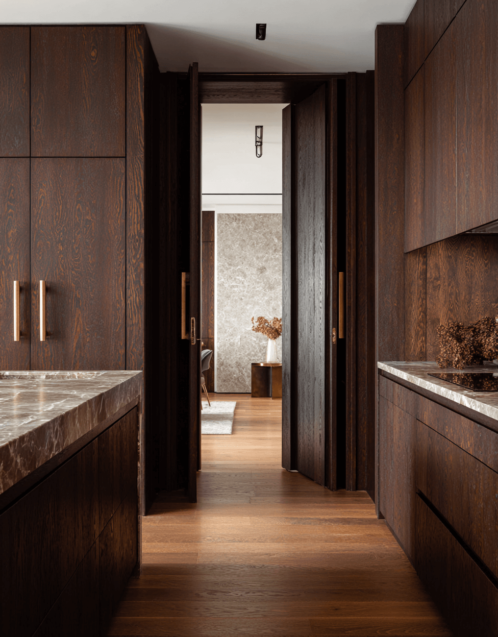 Close-up of textured dark brown leather upholstery with vertical folds.