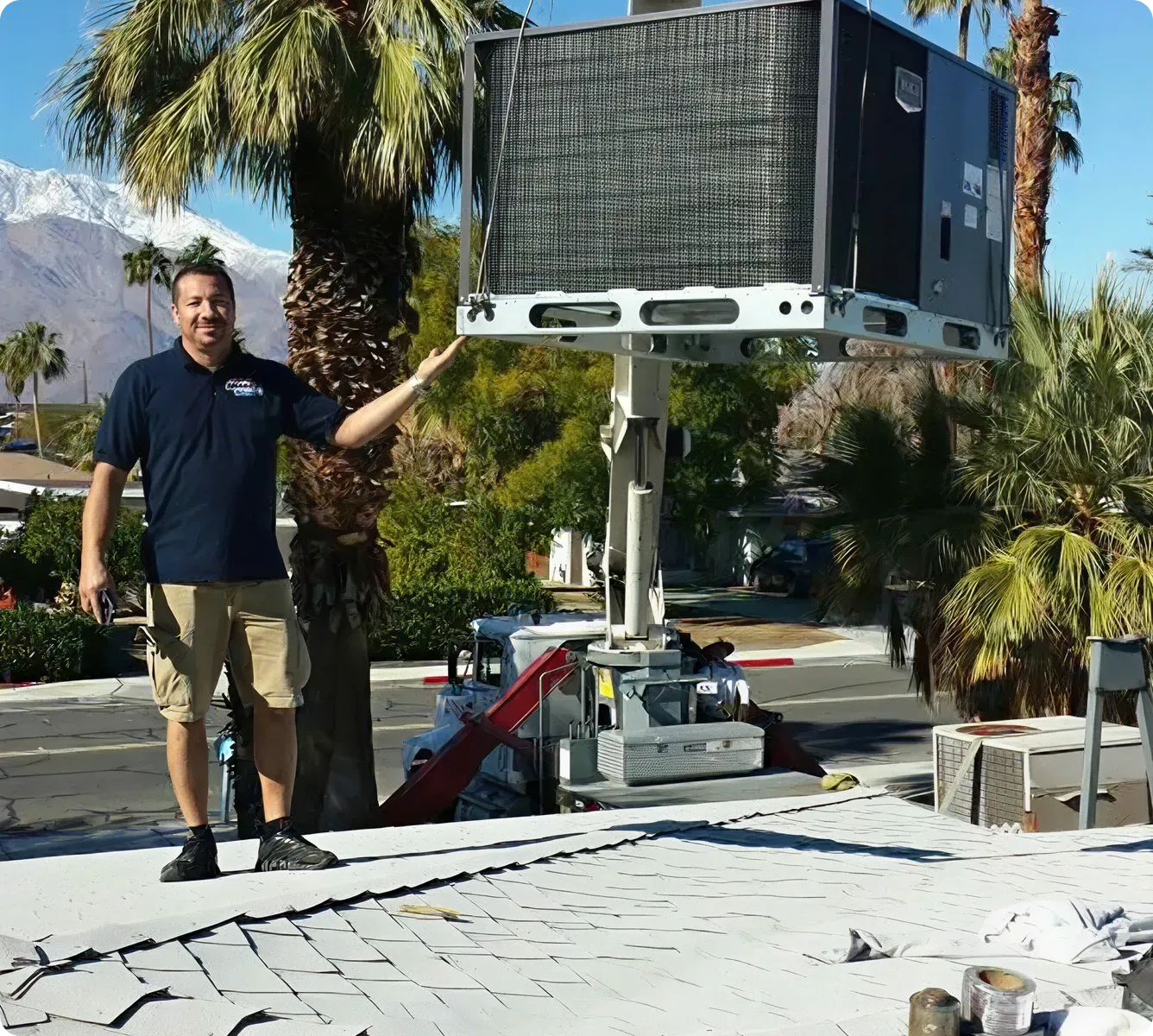 A technician installs an HVAC unit on a rooftop surrounded by palm trees in a sunny location.