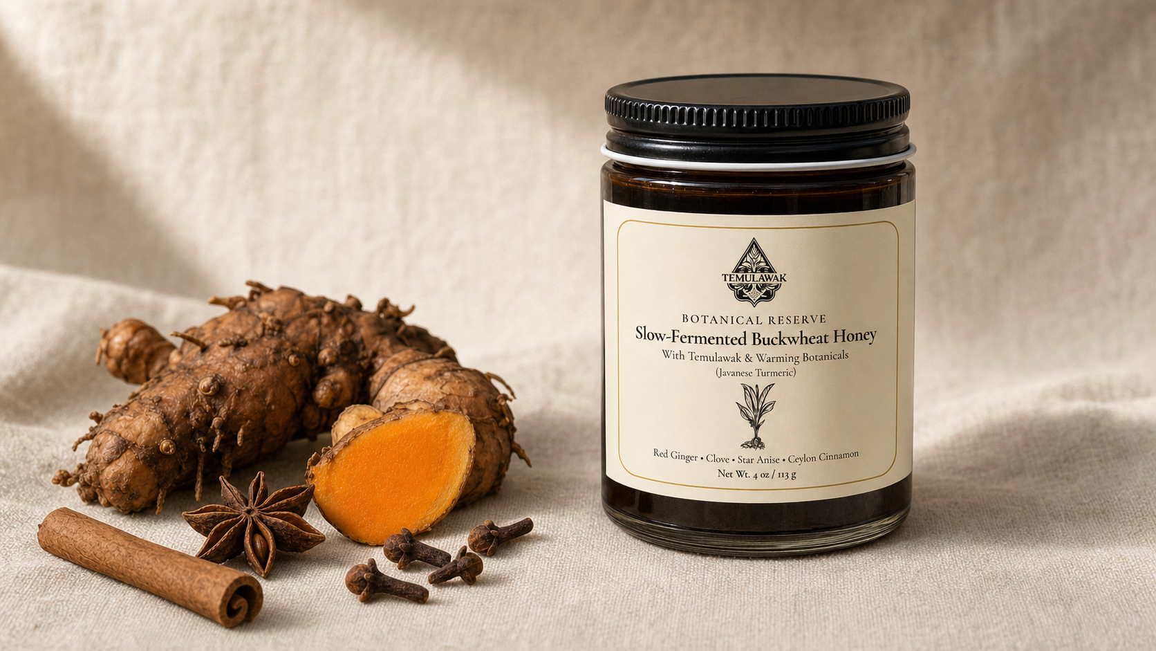 Temulawak slowfermented buckwheat honey jar with fresh Javanese turmeric, clove, and Ceylon cinnamon on cream linen.