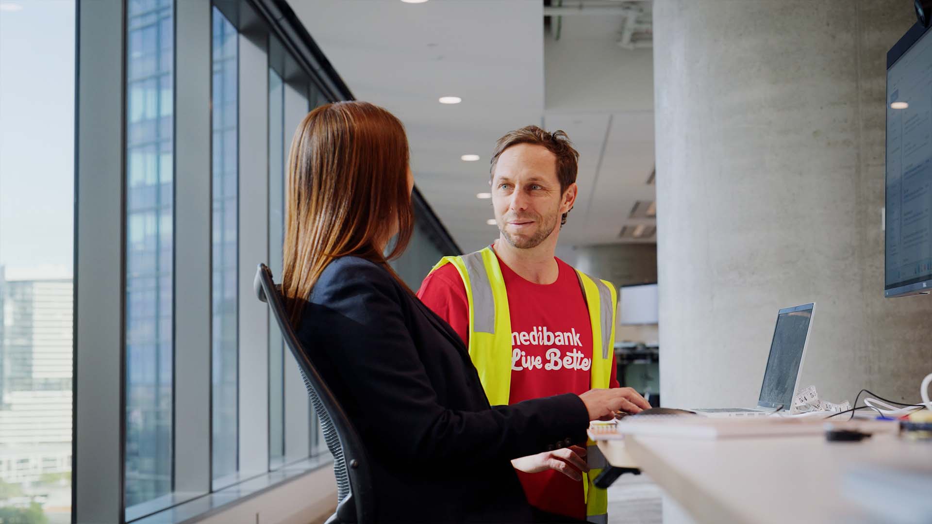 corporate staff members engaging in discussion for video production