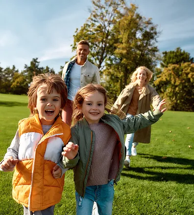 Happy children outside working out and being active