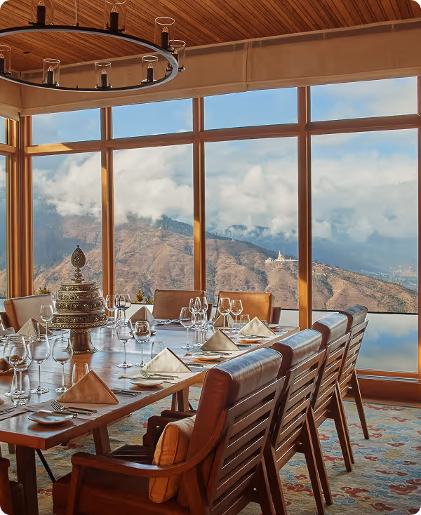 Elegant dining room with panoramic mountain view and scenic landscape