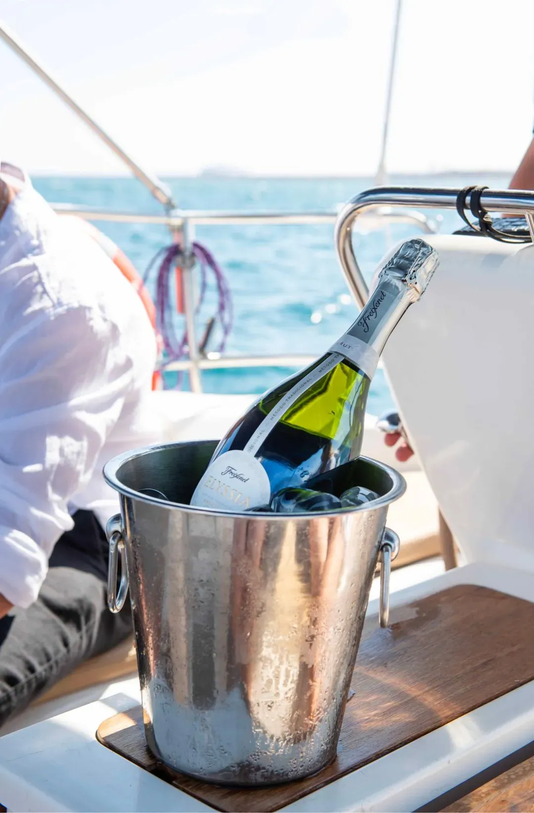 Cava on an ice bucket on a boat
