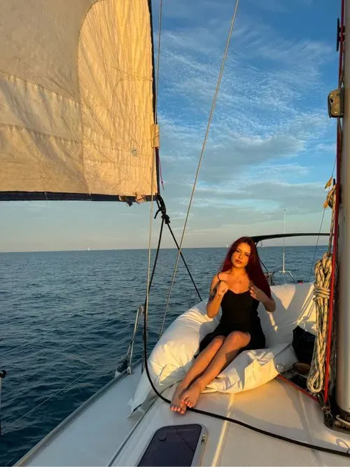 vela boat trip barcelona sunset experience