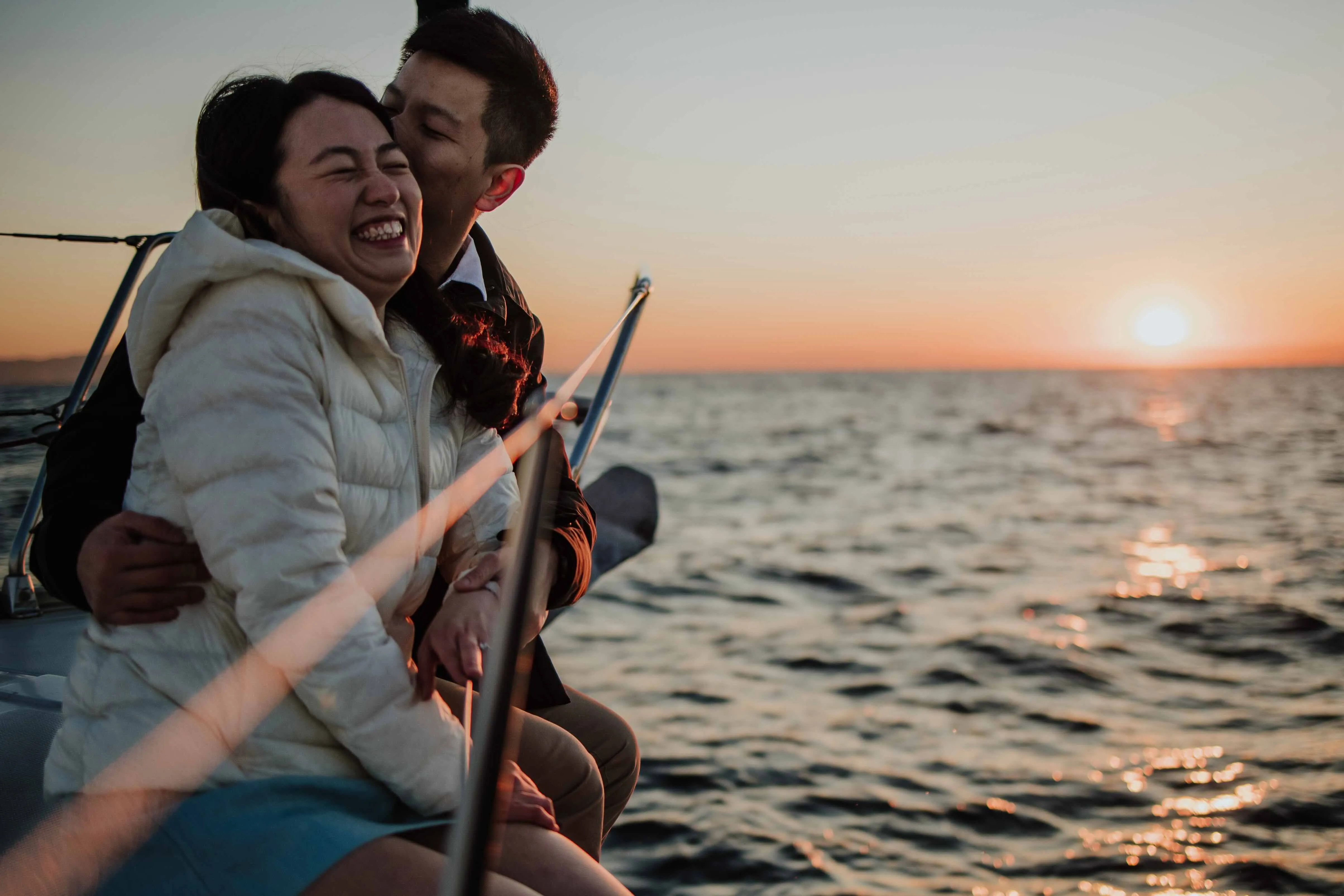 sailing at sunrise in barcelona for a marriage proposal