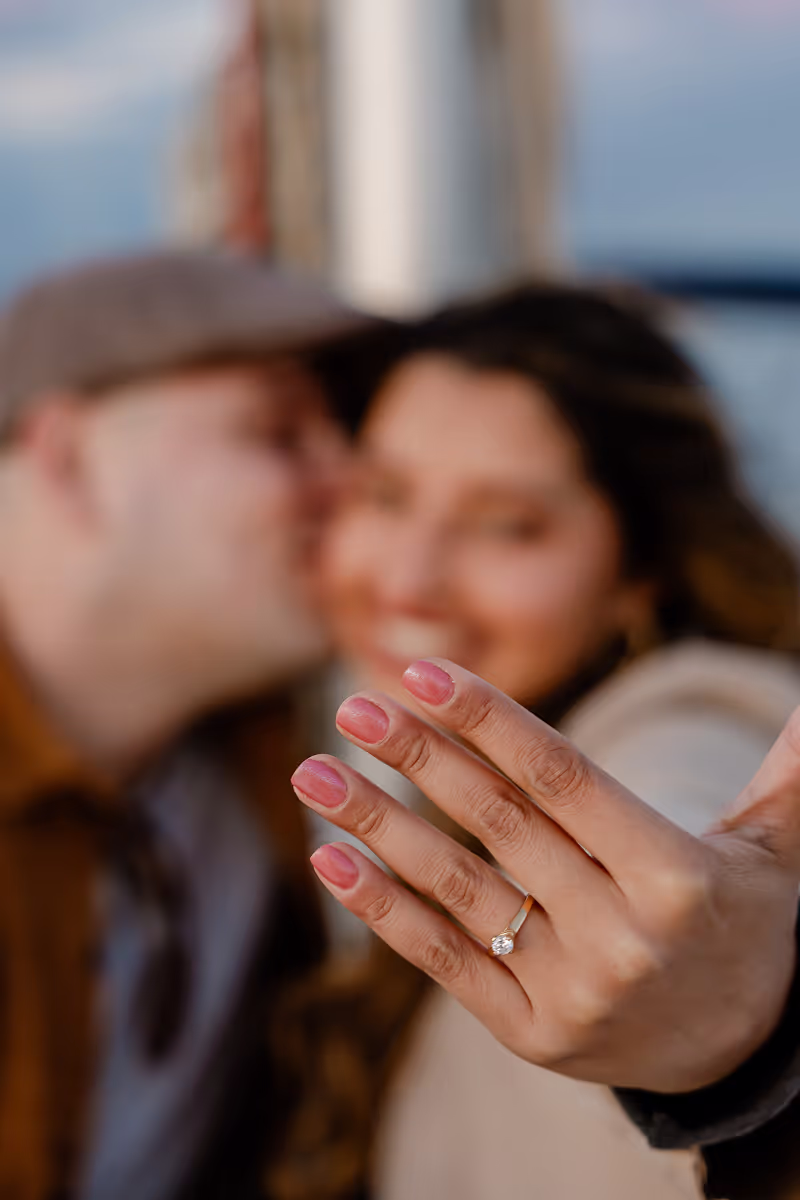 A couple enjoying their Marriage Proposal Boat Trip in Barcelona