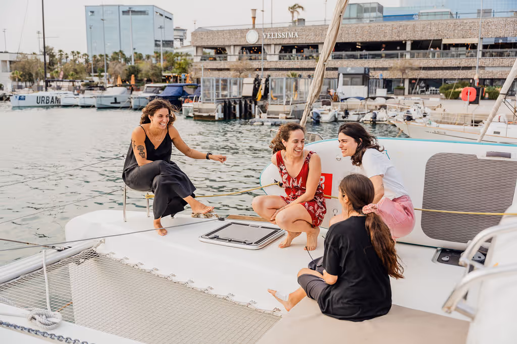 girls enjoying a sail on a catamaran