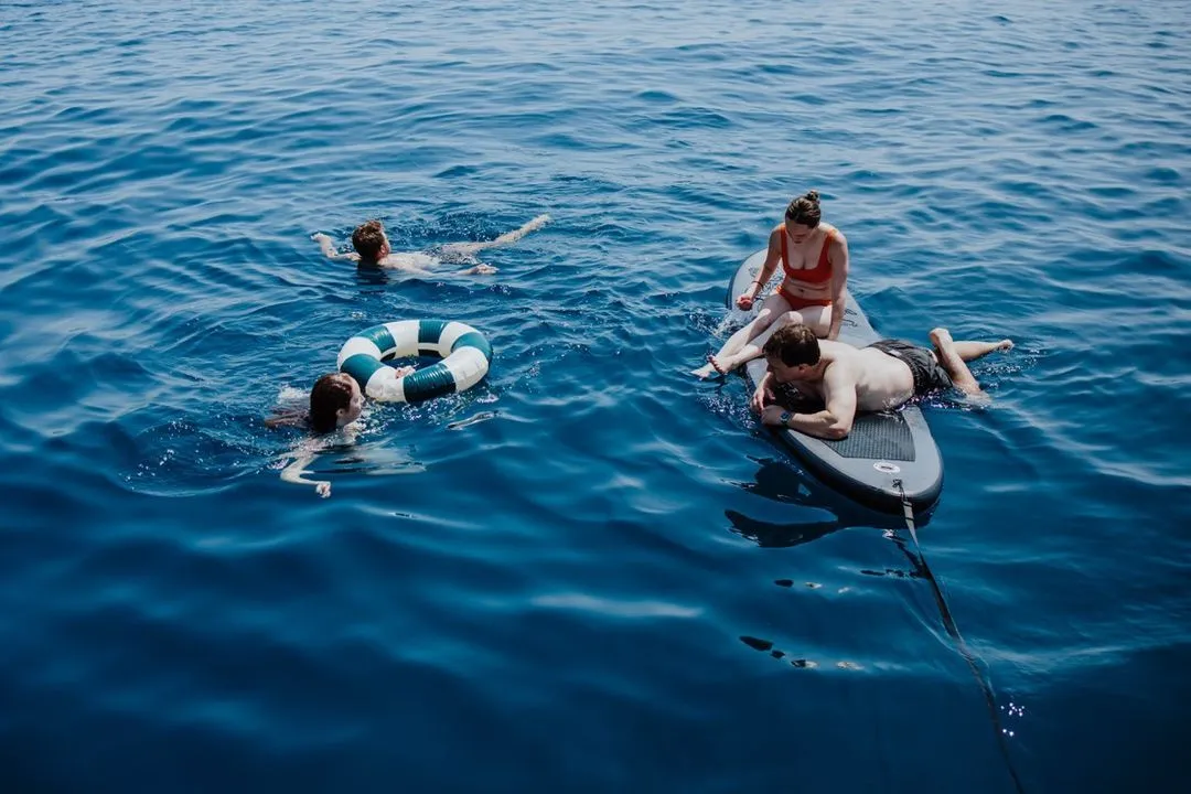 Swim stop sailing trip on a boat in Barcelona