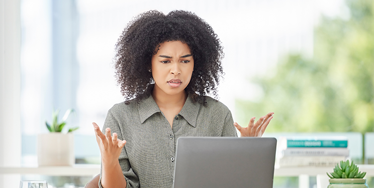 Frustrated woman trying to determine difference in rejected and denied claims.