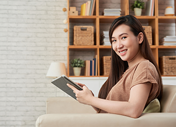 Woman on tablet at home