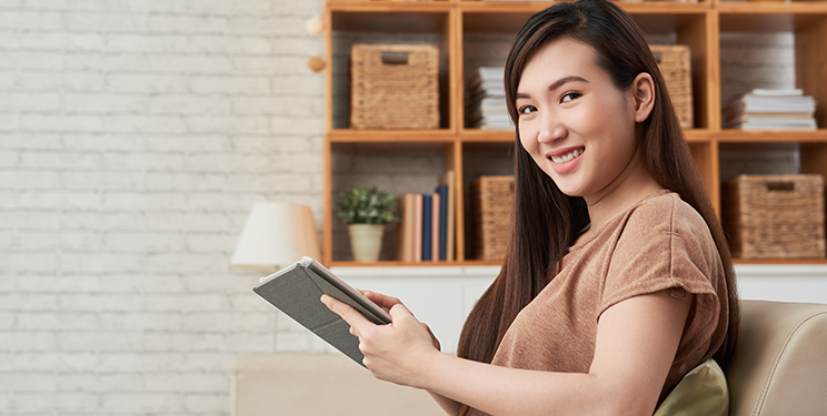 Woman on tablet at home