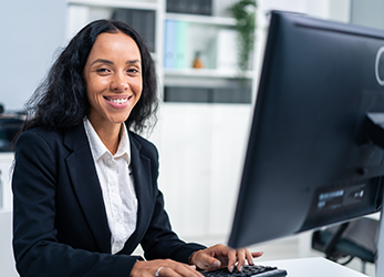 Happy woman processing claims