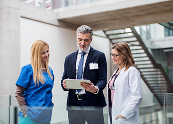 Healthcare team reviewing revenue data