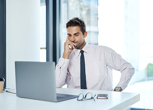 Man reviewing RCM teams on computer