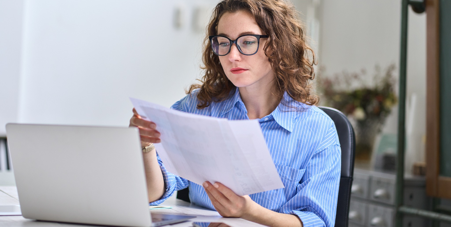 Woman reviews papers