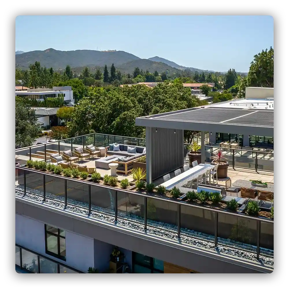 One Shot Productions Team photo throwing balls and smiling