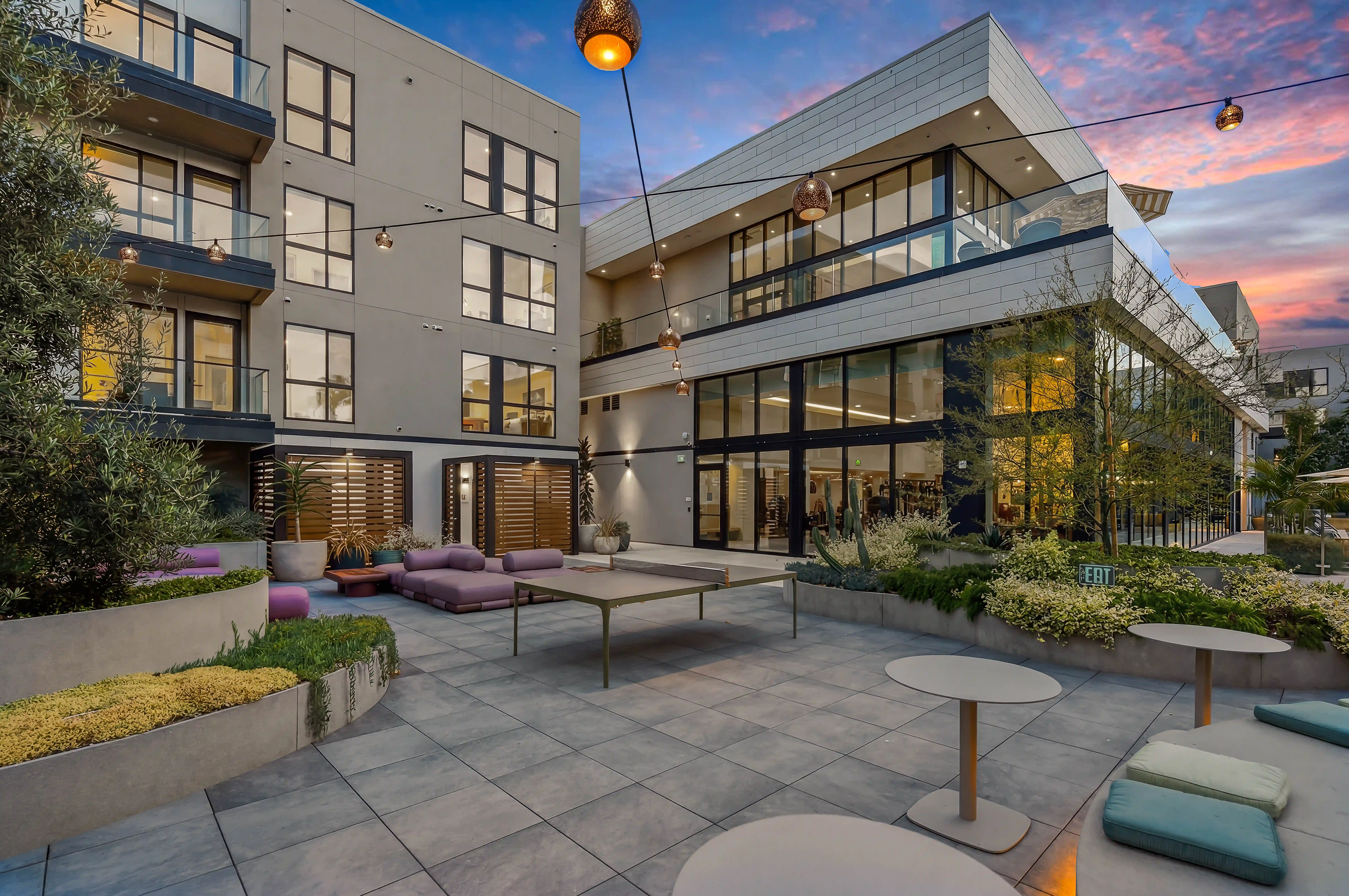 Modern residential courtyard at dusk