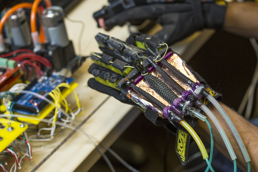 "A glove powered by soft robotics to interact with virtual reality environments" by Jacobs School of Engineering, UC San Diego is licensed under CC BY-NC 3.0 US, https://jacobsschool.ucsd.edu/news/release/2225?id=2225
