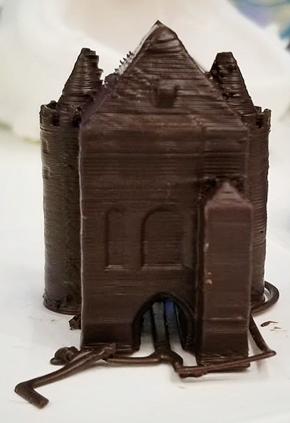 A 3D-printed chocolate castle ("3D Printed Chocolate" by FM1418 / CC BY-SA 4.0 via Wikimedia Commons)