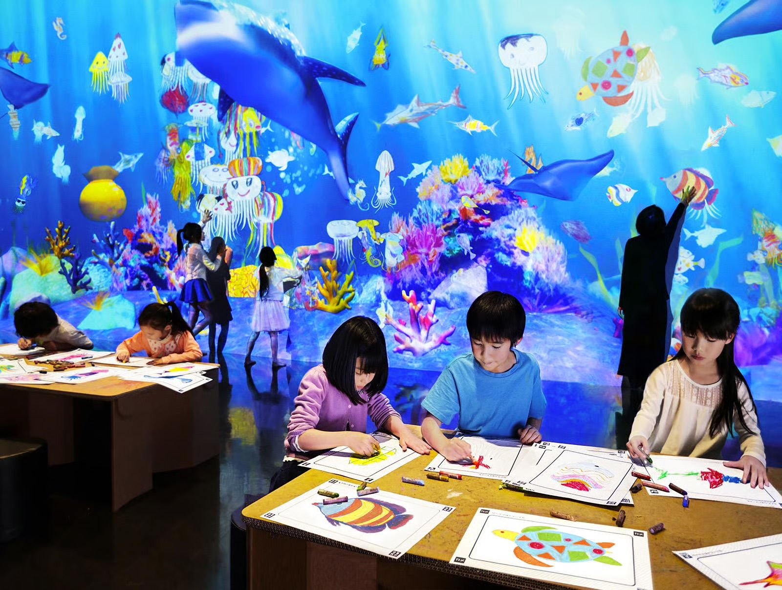 TeamLab's Sketch Aquarium, where kids' hand-drawn sea creatures come alive inside a giant digital aquarium