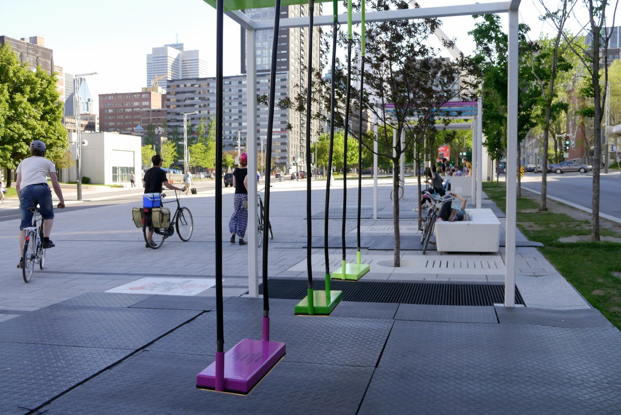 The 21 Swings art exhibit in Montreal, which transforms swings into giant musical instruments  ("21 Balançoires" by art_inthecity / CC by 2.0 via Wikimedia Commons)