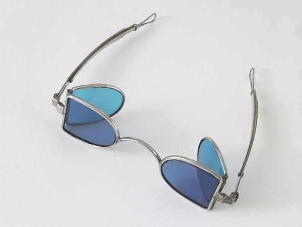 These 1850 eyeglasses have four colored lenses and were worn to help protect weak eyes from bright light, dust, and the wind when out riding or driving