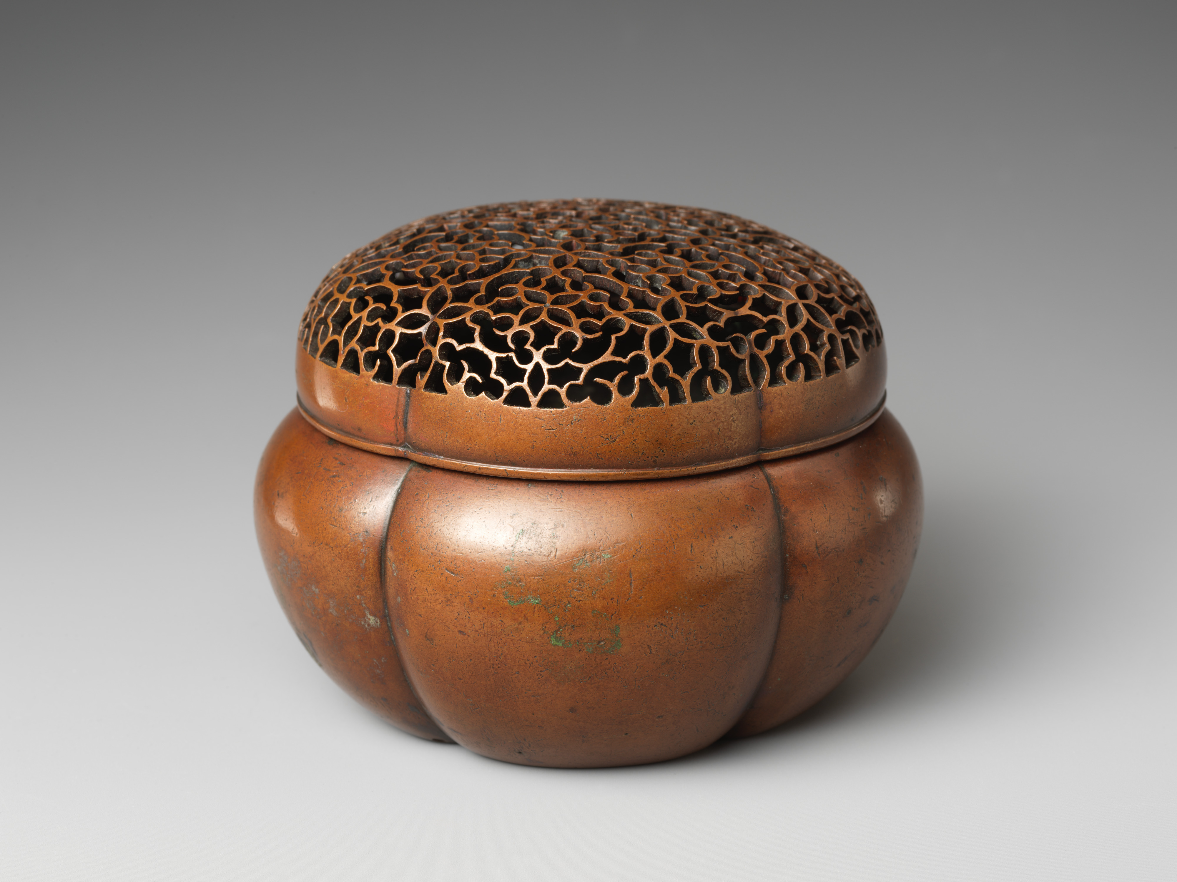 A hand warmer, also known as a sleeve censer (xiulu), from 17th century China