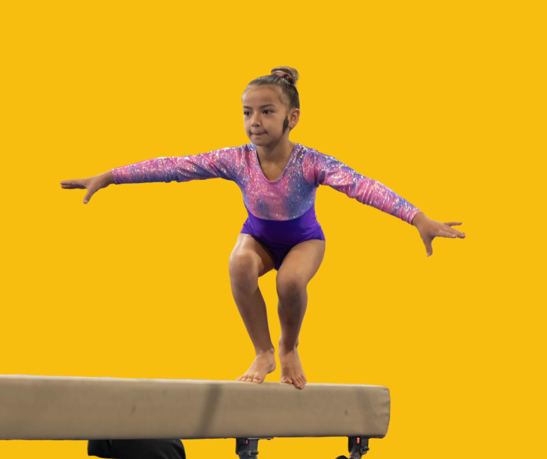 Concentration on the face of a gymnast during a competitive bar routine