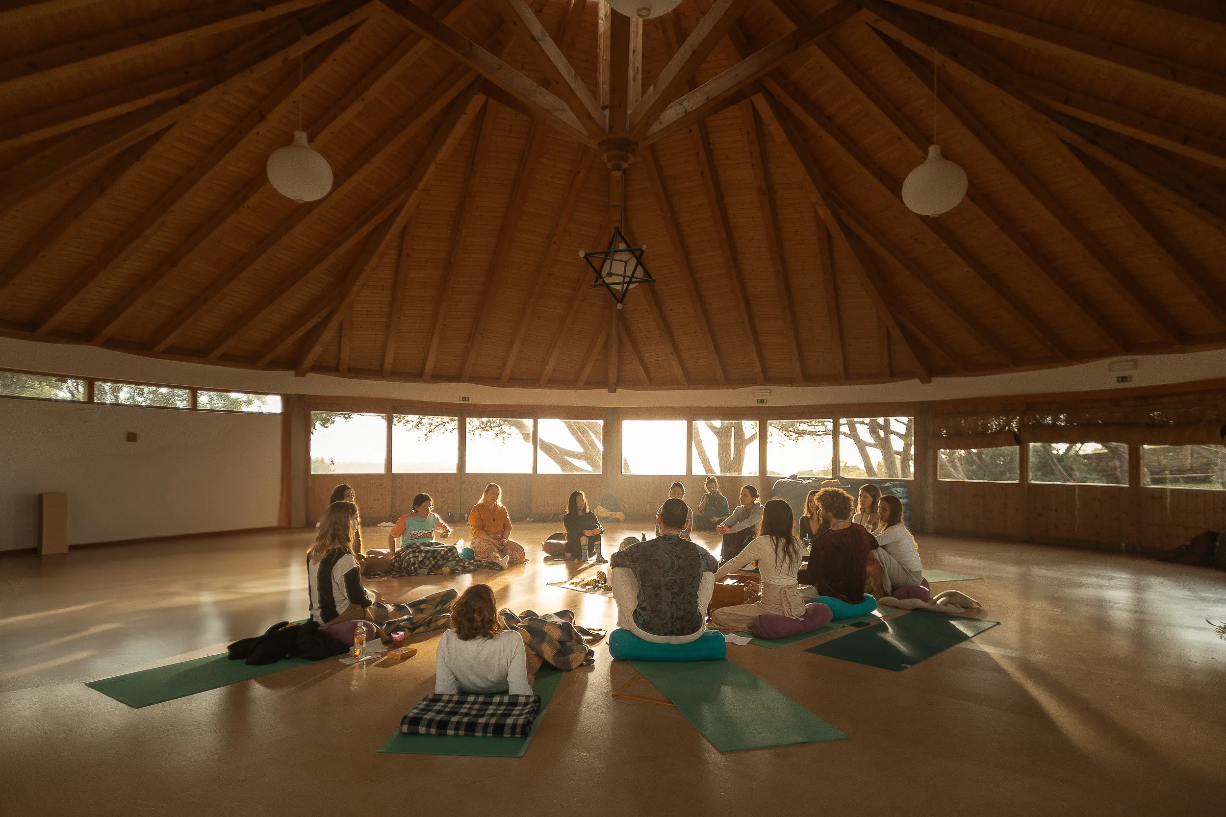 Female circle on the mats in retreat space