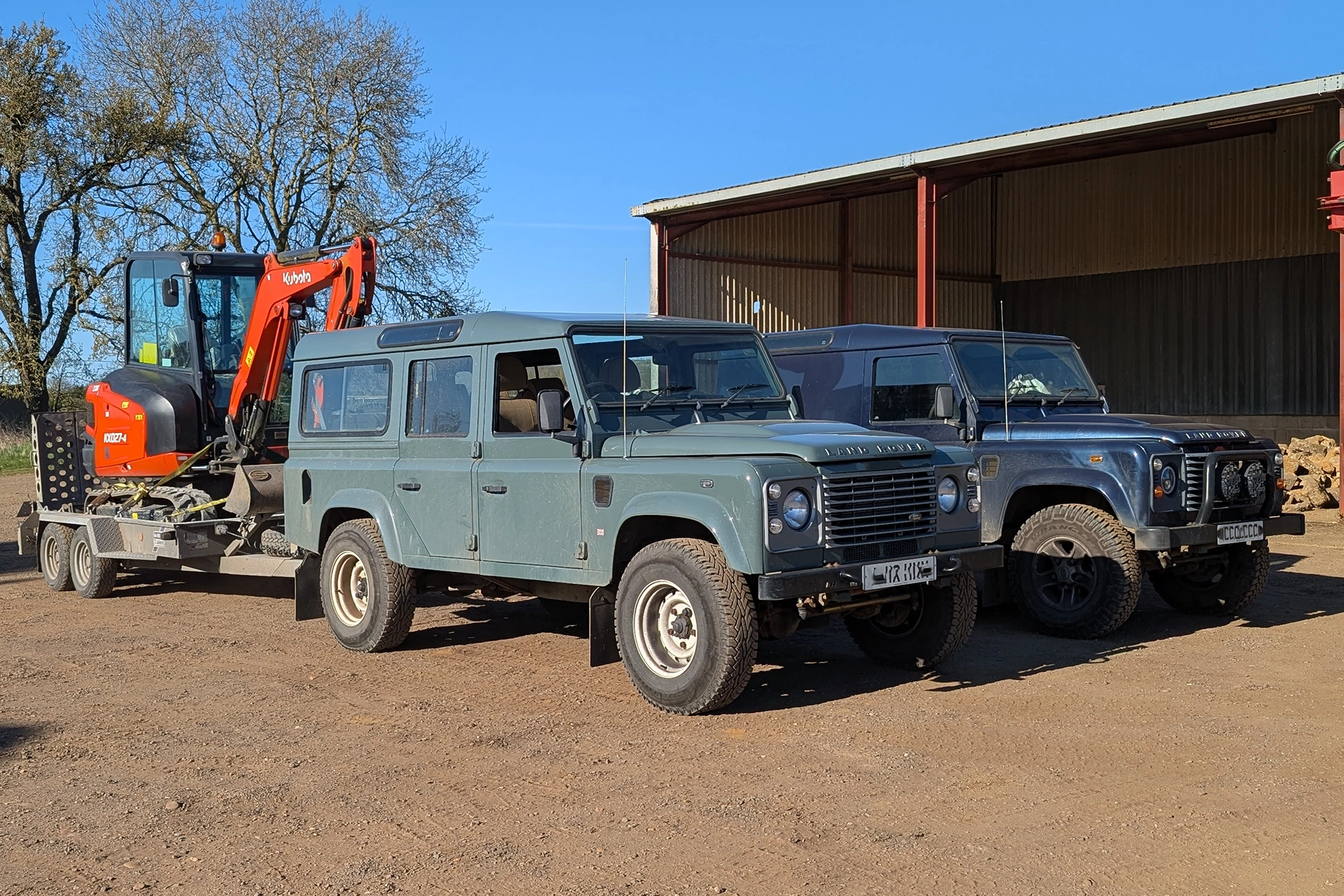 Our land rovers & digger at our yard in Cranford, near Kettering ready to start processing and delivery ironstone.