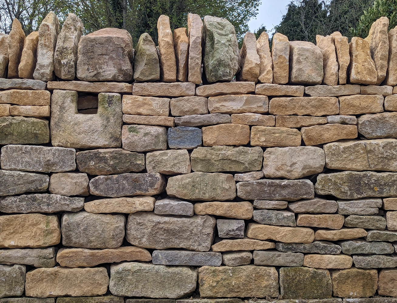 Dry stone wall constructed in Geddington, Northants