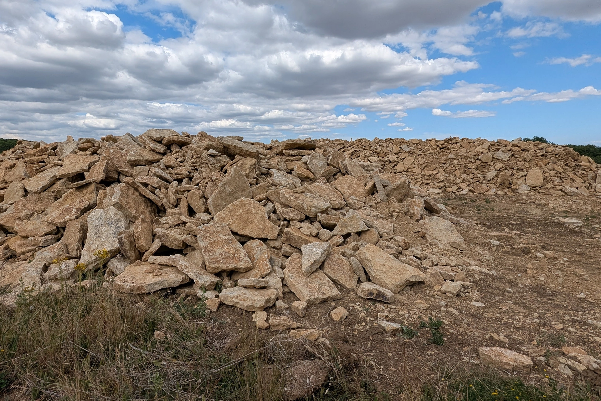 Freshly quarried Blisworth limestone from our quarry ready for sorting and separating out into walling products