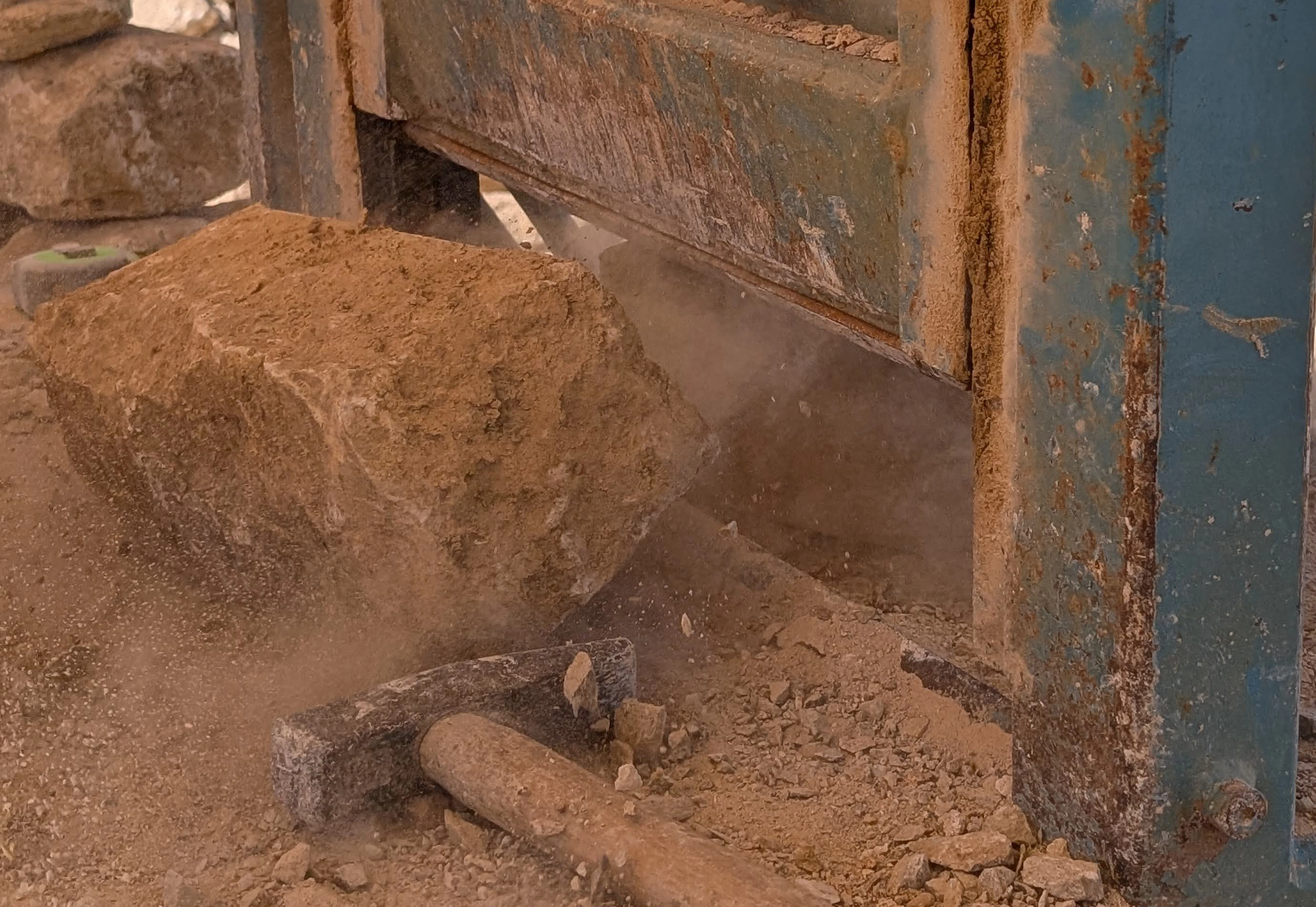 Reclaimed Northampton limestone being cropped on our stone guillotine