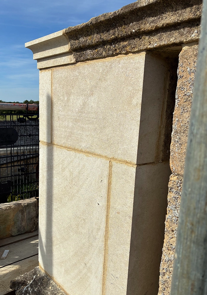 Bath stone quoins used to rebuild a chimney