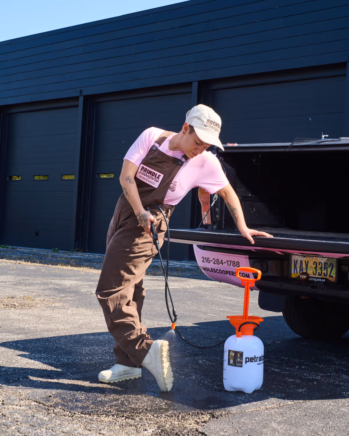 pet waste technician sanitizing shoes between visits