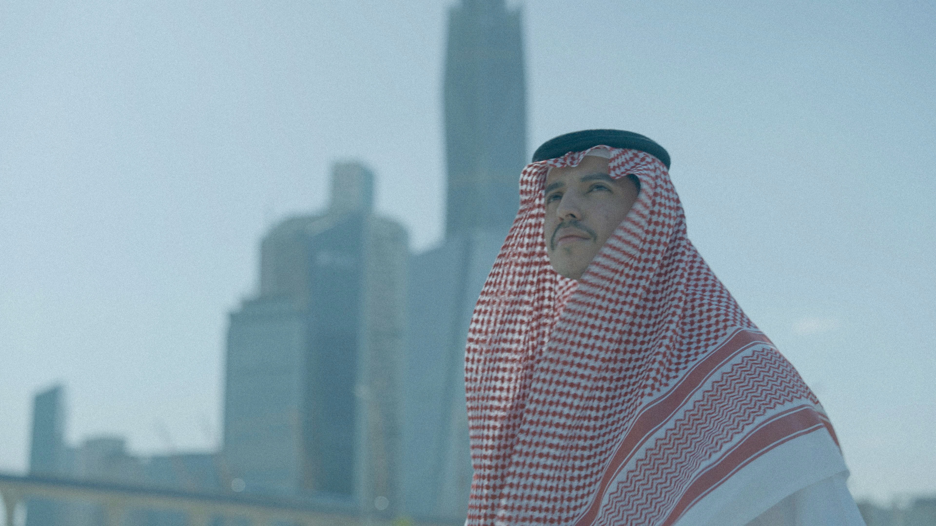 Man Looking at the distance with KAFD in the background