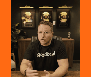 Blake Snodgrass sitting in his office discussing marketing