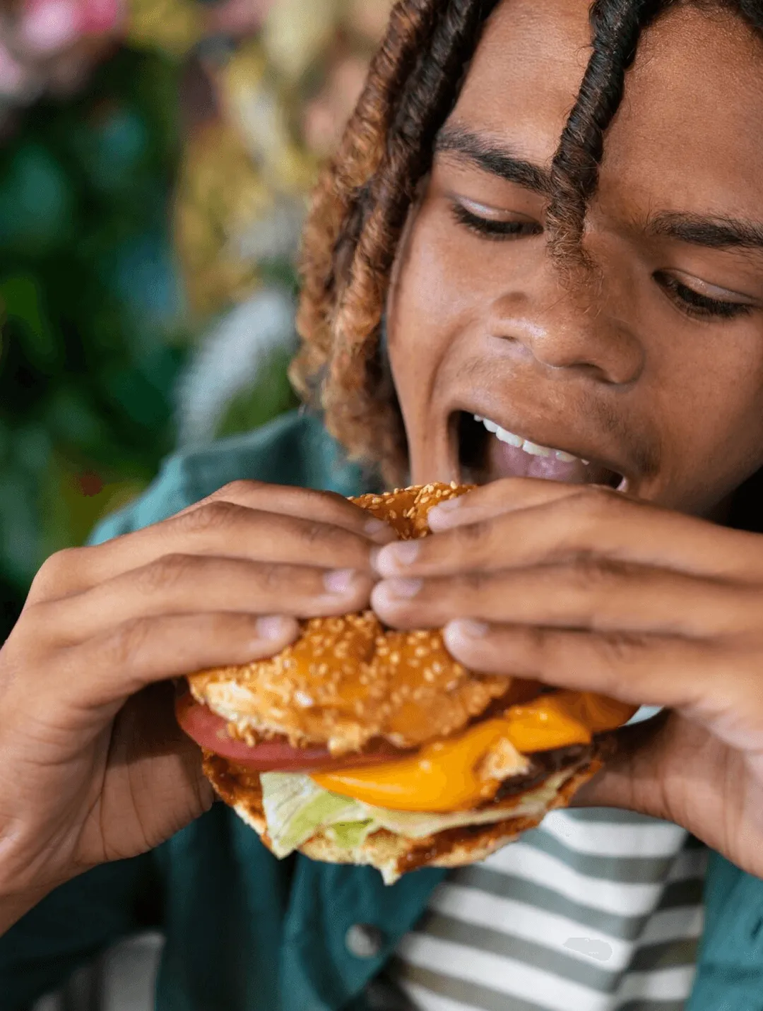 Man eating burger