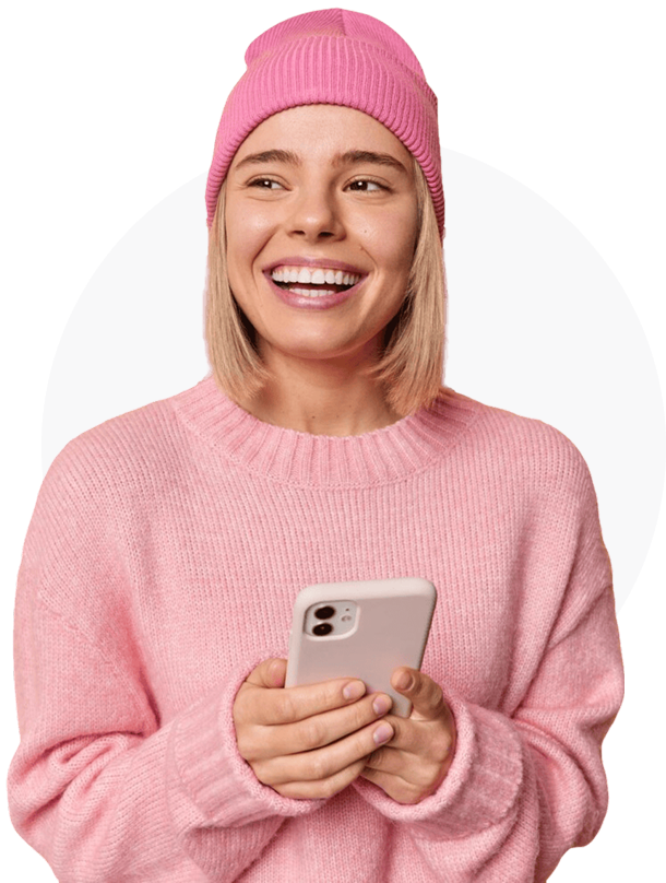 A woman holding her phone with her Human Likelihood Score under it.