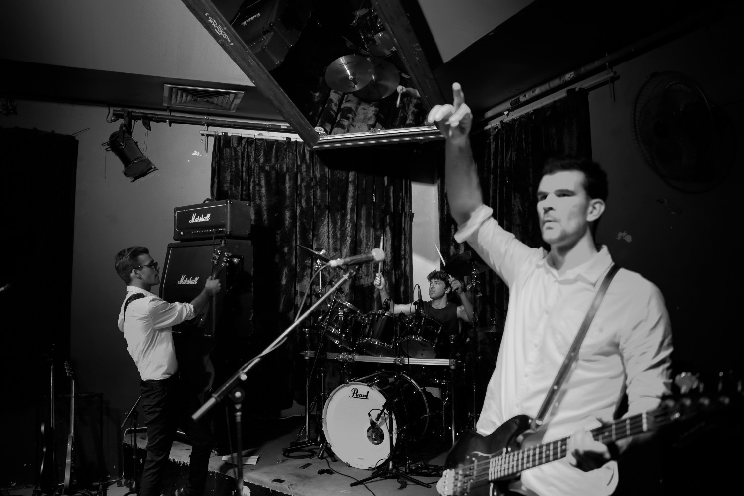 [background image] image of band rehearsal space (for a musician & band).