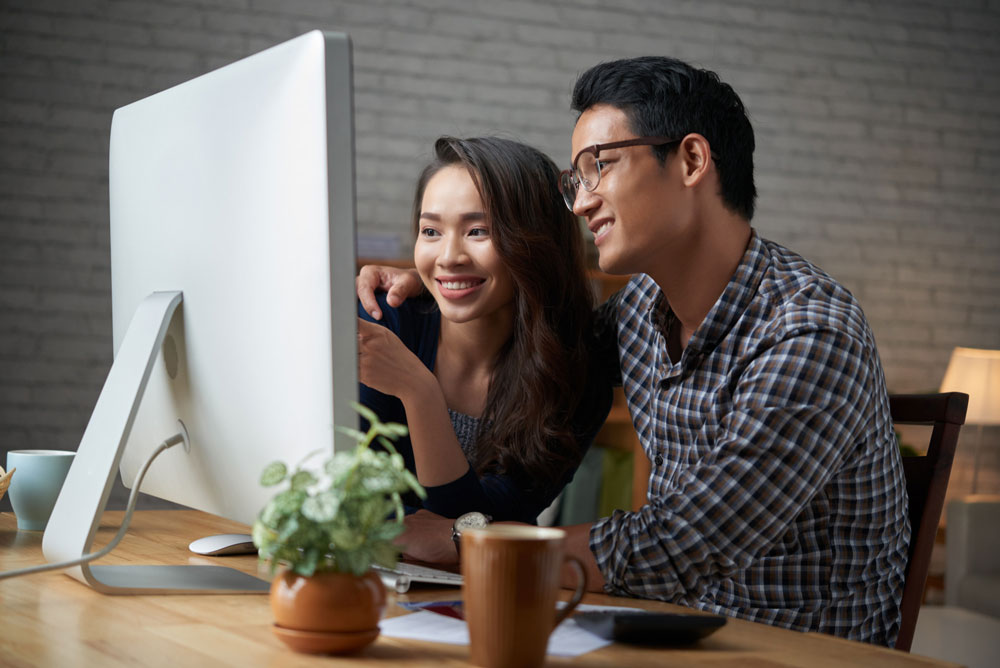 happy business owners about no hidden fees