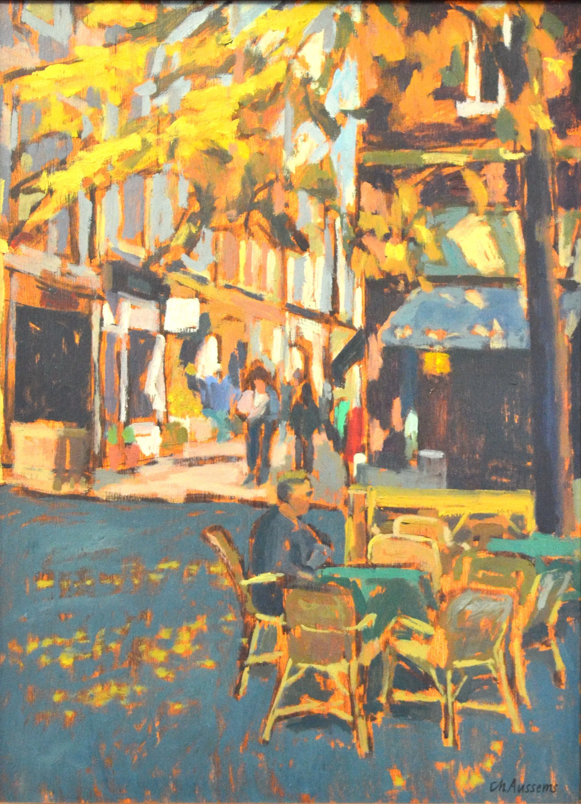 Impressionist painting of a person sitting alone at a table with chairs on a sunlit street terrace with autumn trees.