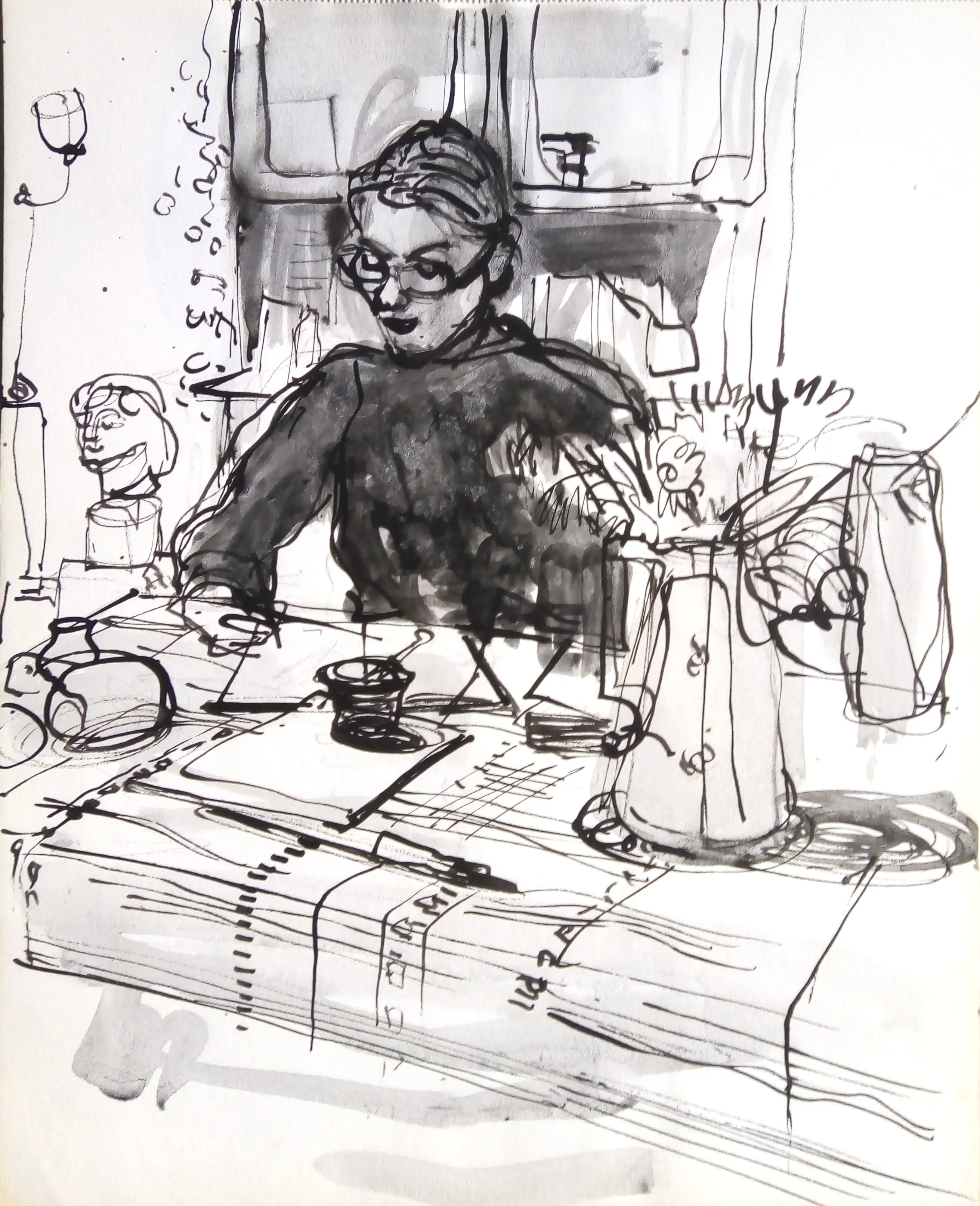 Ink and watercolor sketch of a person wearing glasses sitting at a table with papers, a pen, a cup, a vase with flowers, and a bust sculpture in the background.
