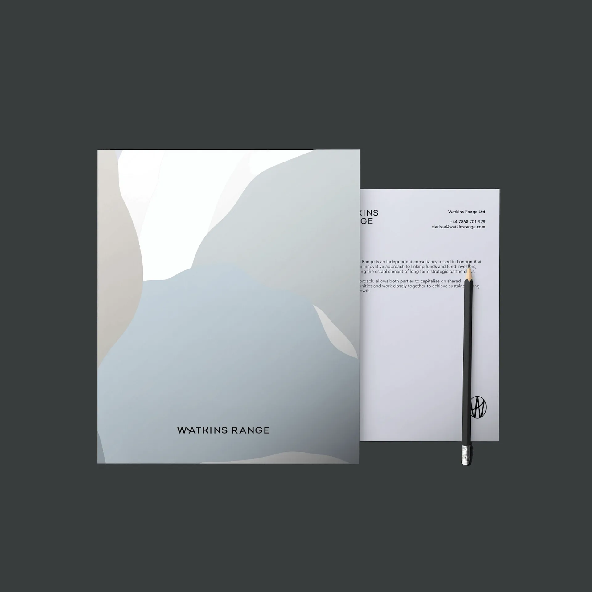 Corporate stationery set with a folder and letterhead featuring abstract shapes in soft blue and grey tones and the text Watkins Range.