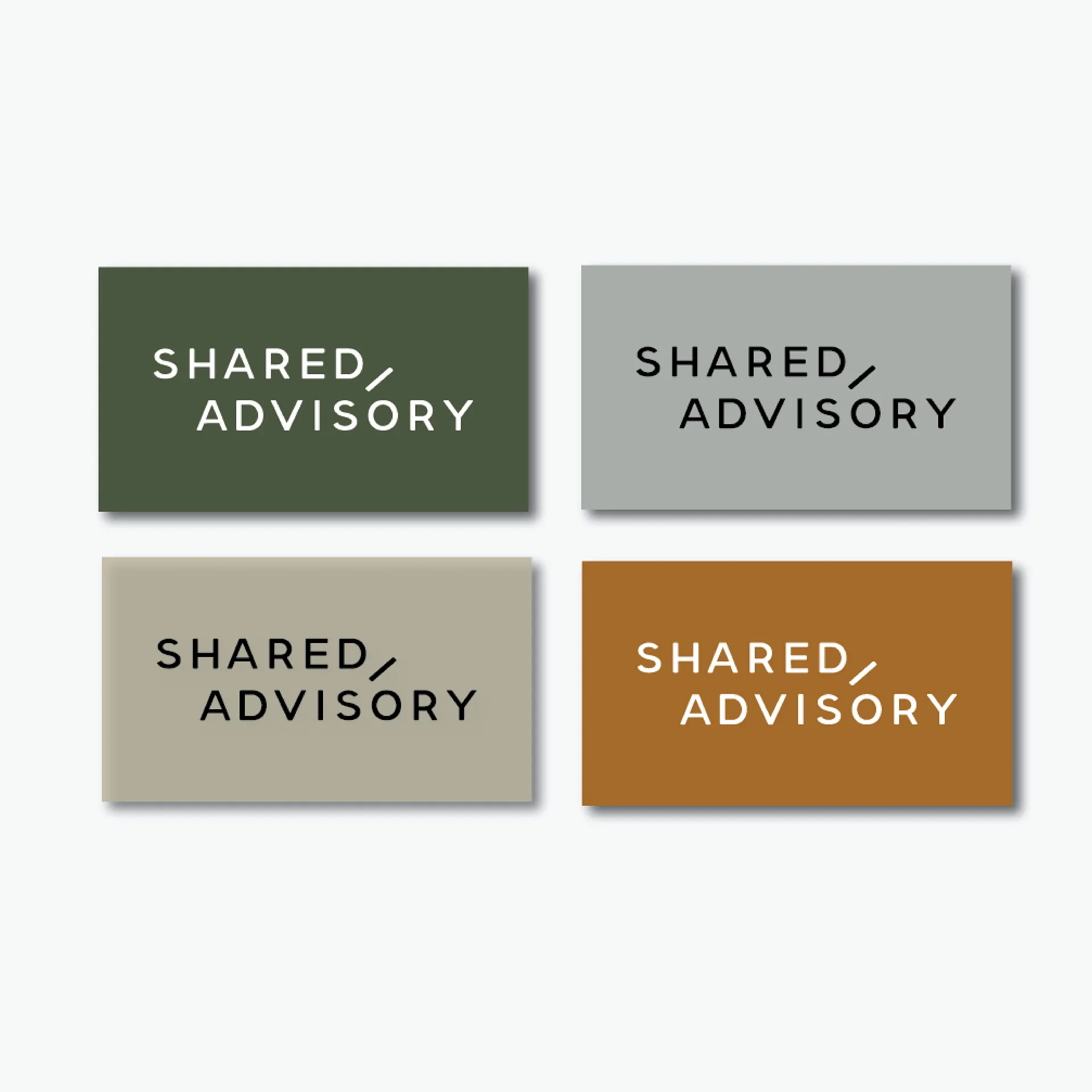 Four business cards with the text 'SHARED ADVISORY,' each card in different colours: dark green, light grey, beige, and brown.
