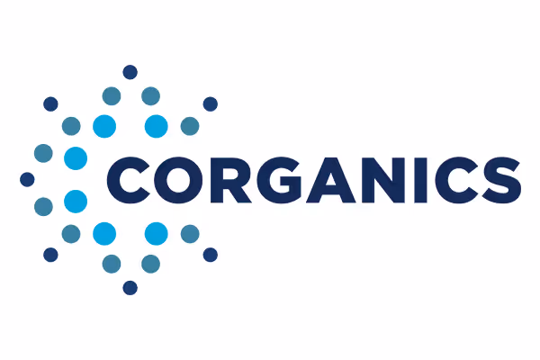 Corganics logo with a cluster of blue and teal dots forming a diamond shape to the left of the word 'CORGANICS' in bold navy blue letters.